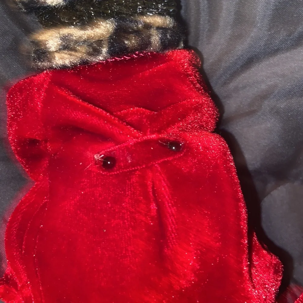 Vintage African American doll ornament with red velvet and leopard fur purse
